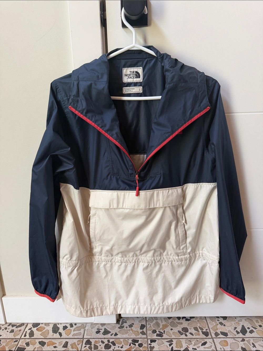 The North Face packable jacket in Navy, Cream & Red Half-Zip Anorak
